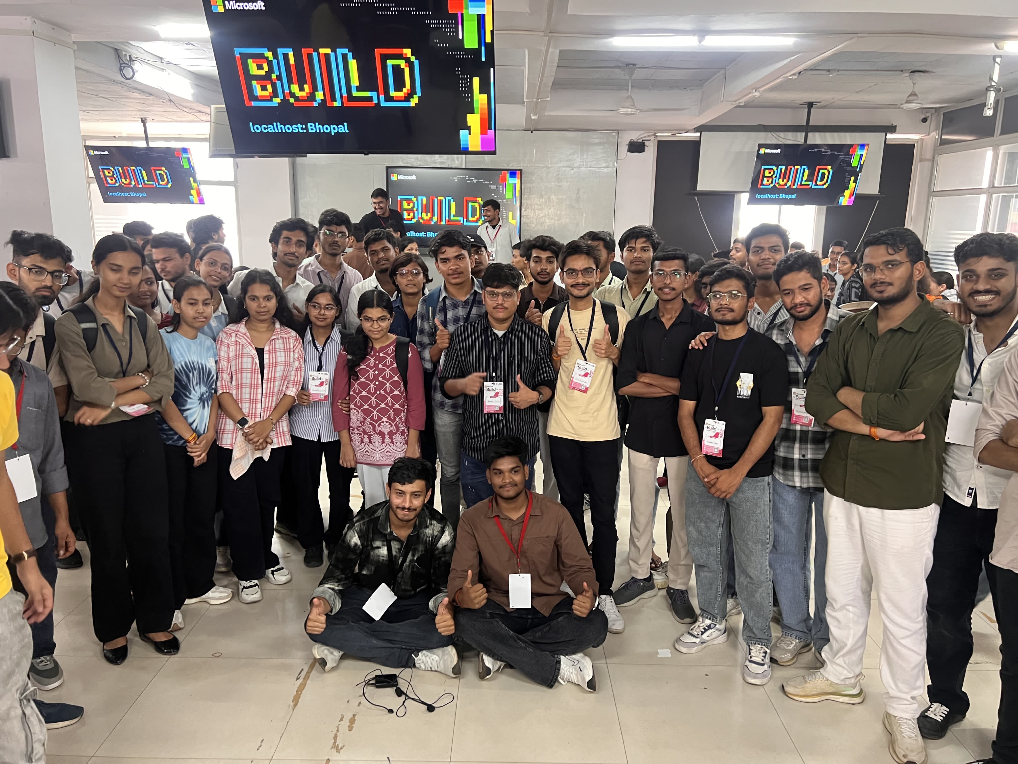 Knowvy crew and attendees at the Microsoft BUILD localhost: Bhopal banner — building beyond limits!